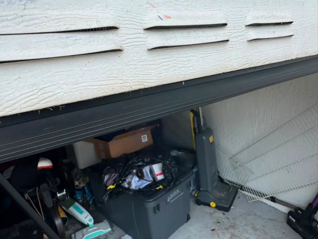 garage-door-panel-and-ventilation-repair